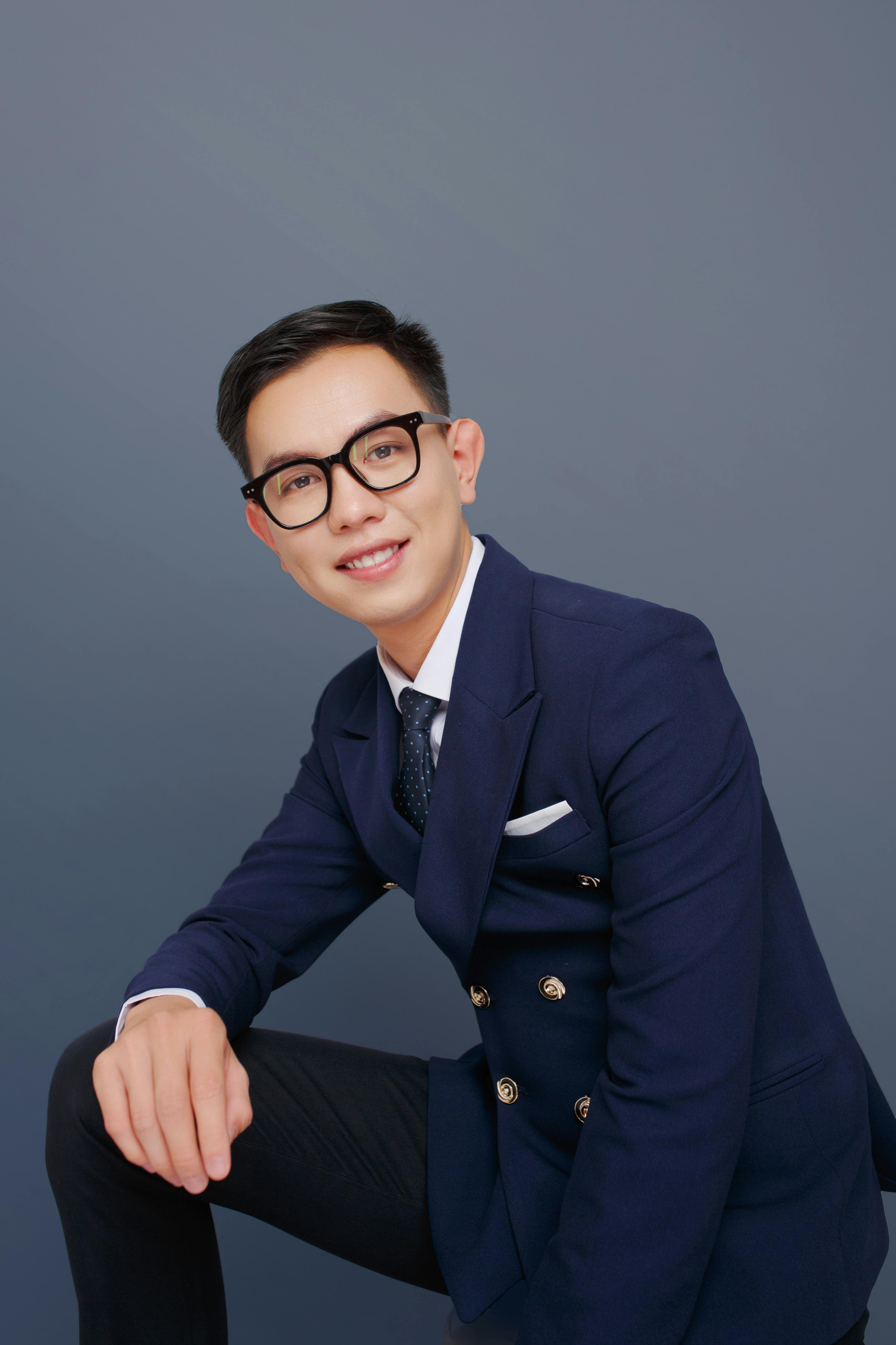 Portrait of handsome businessman in office